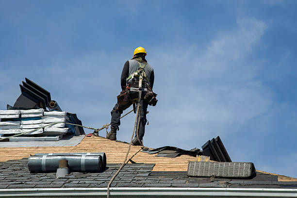 Professional Roofing technician working in Manorville, NY
